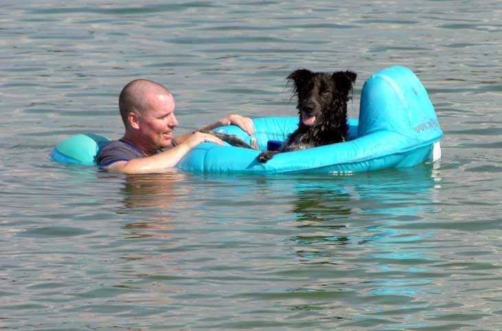 Chris with their dog Lili