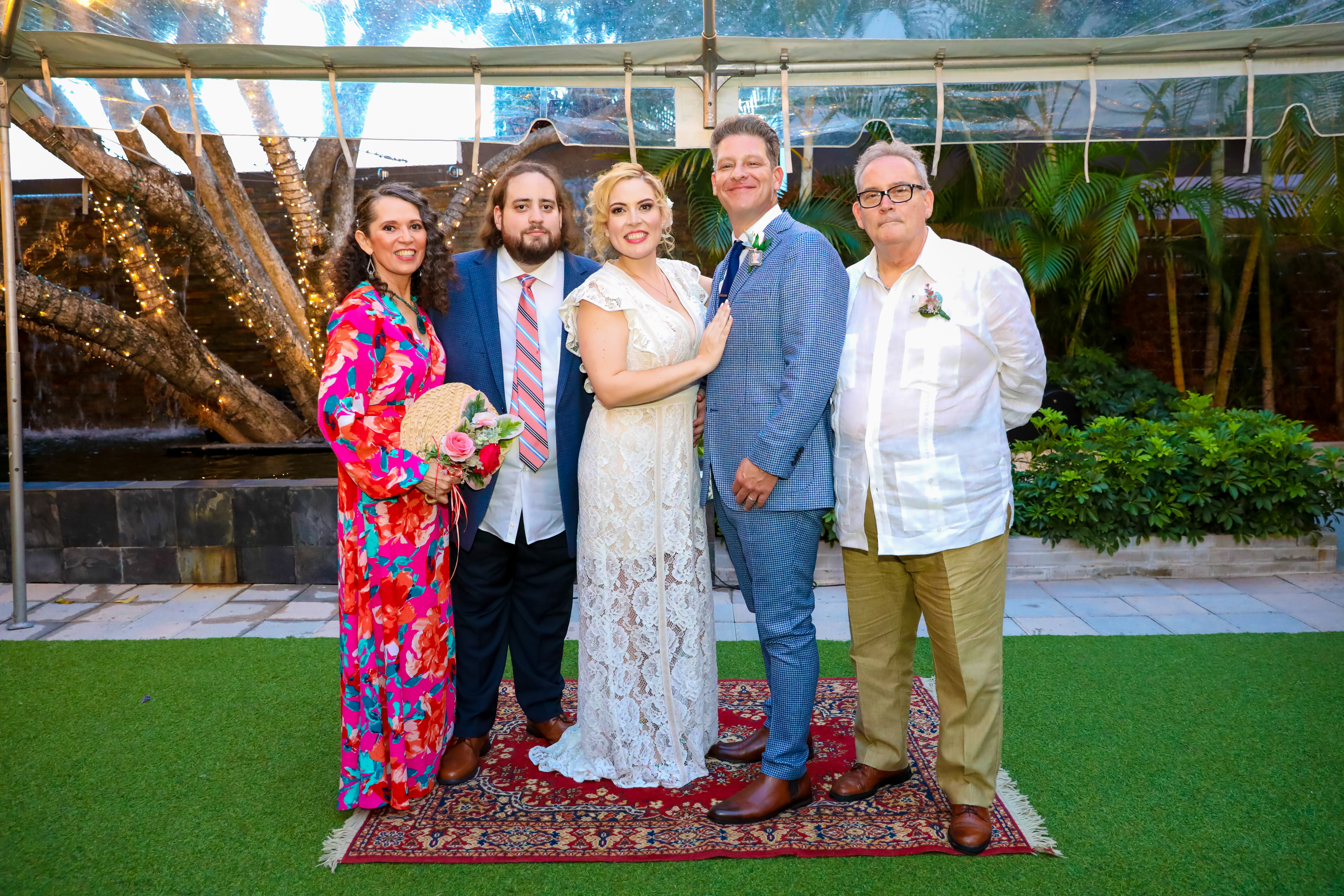 Gaby and Danny at their wedding along with Gabys mom dad and brother
