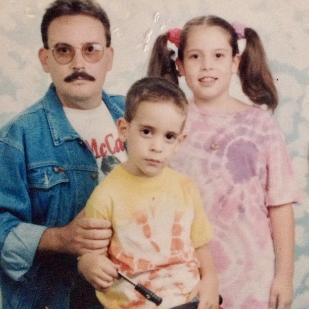 Gaby and her brother with their dad in Venezuela in the 90s