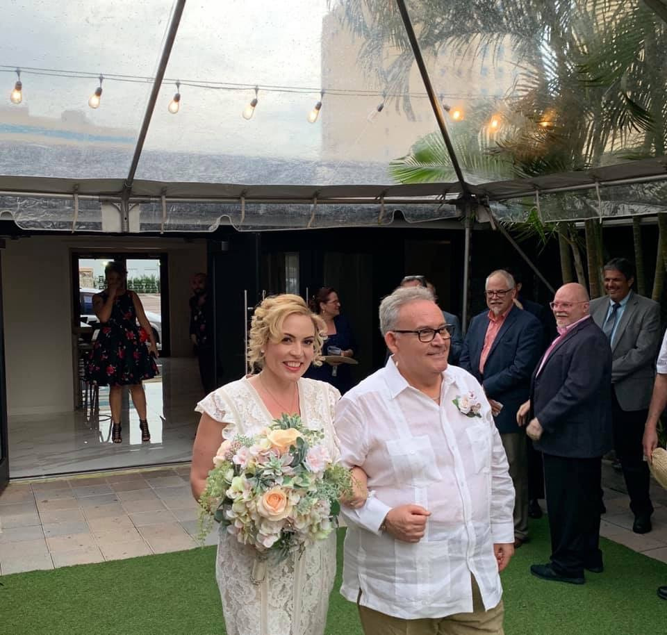 Gabys dad walking her down the aisle