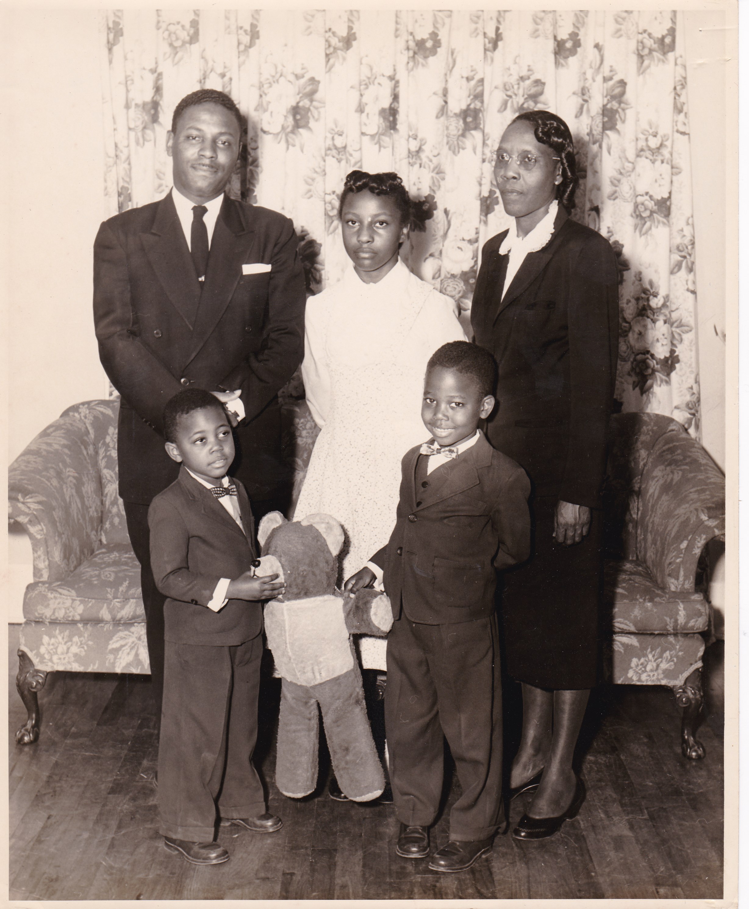 Harold around age 7 with his family