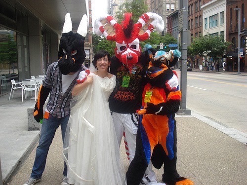 Kate Tellers in her wedding dress with some attendees of Anthrocon o