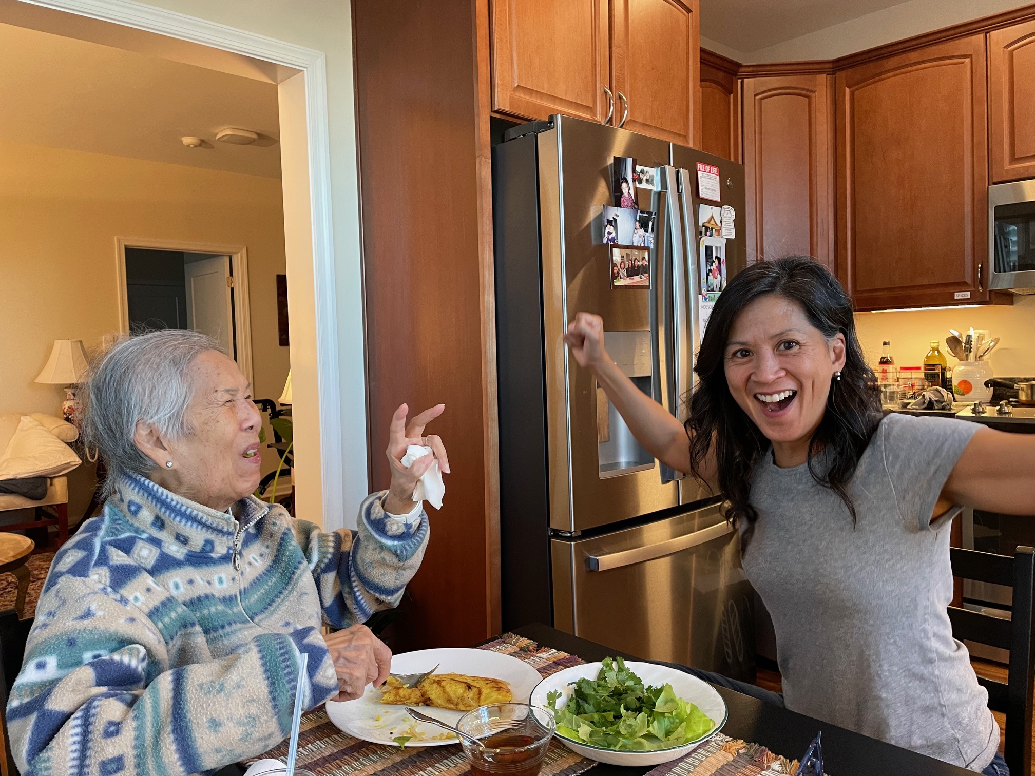 Victorious with mom eating her third Vietnamese crepe
