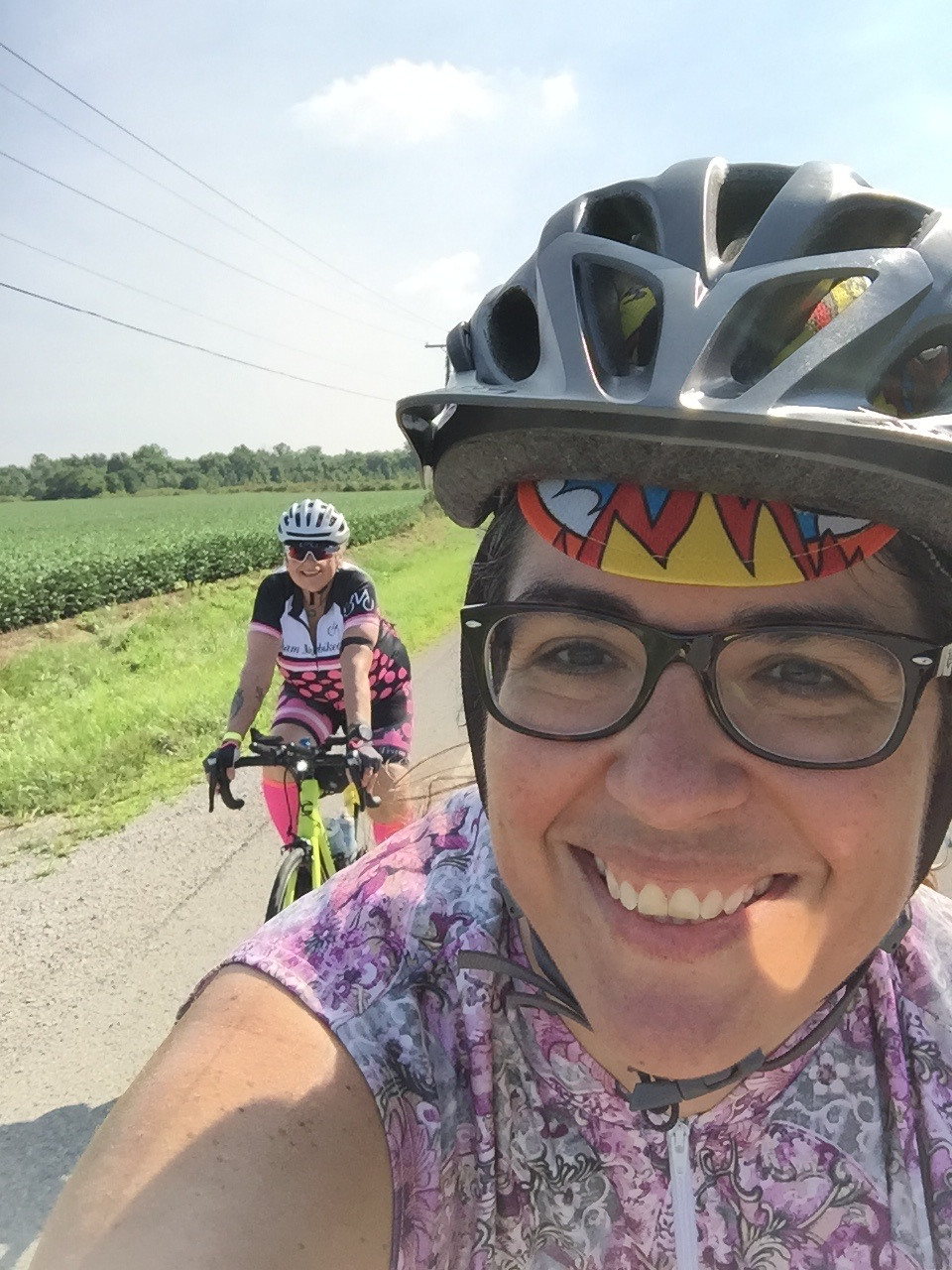 Julie cycling with a friend in Ohio